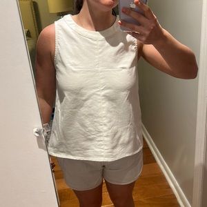 White top with open splice back